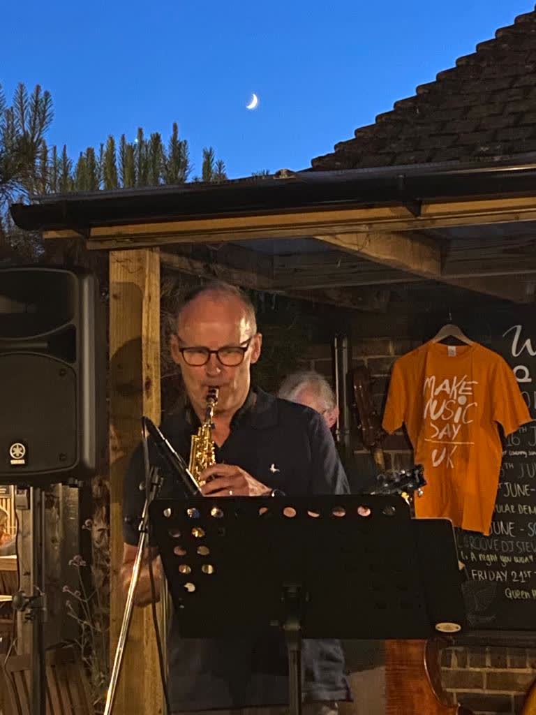 Andy Roberts on toy saxophone