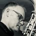 Andy on sax, framed within another sax